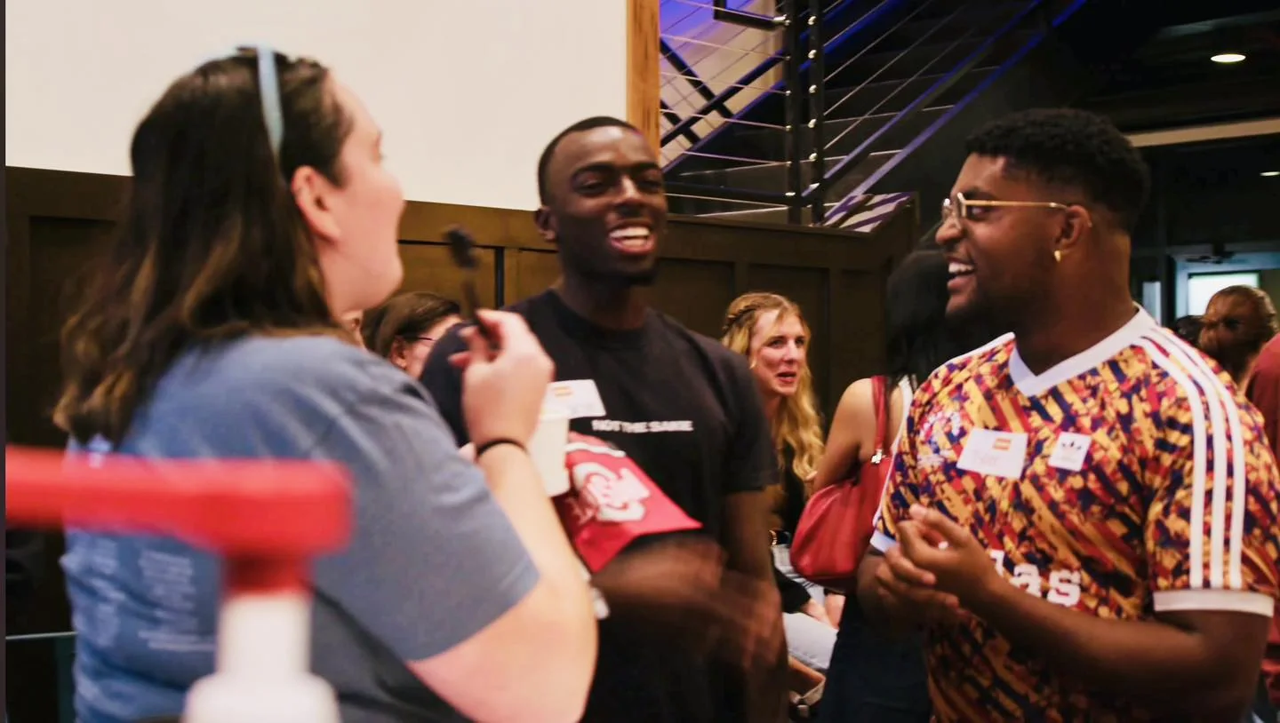 Guests meeting new friends with name tags