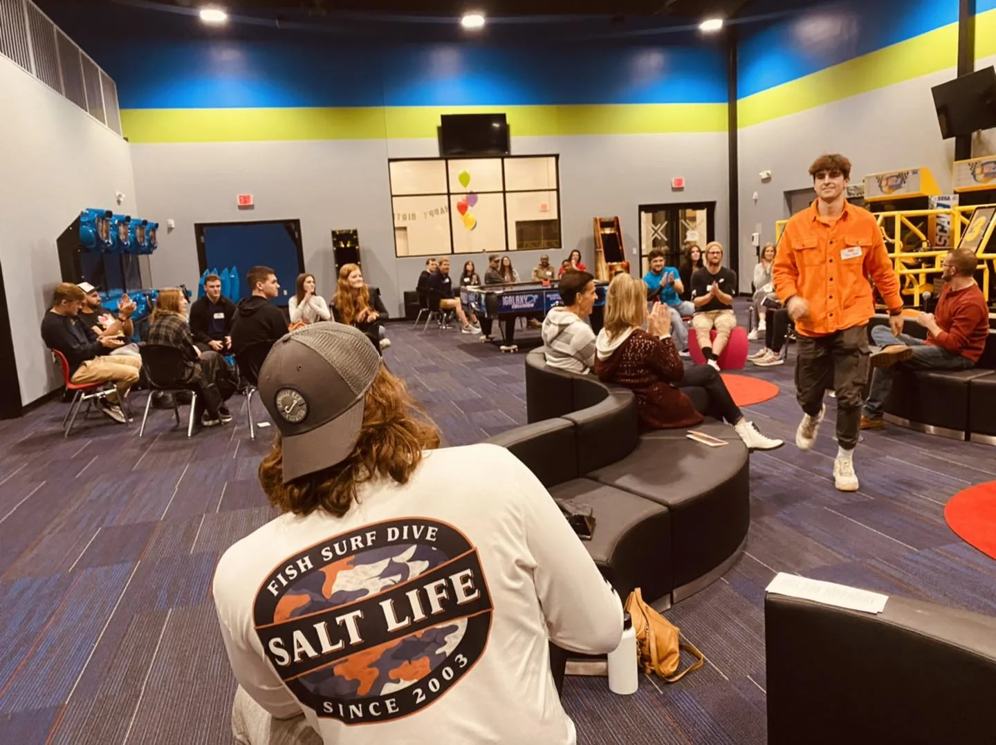 Young adults hanging out at a Joyride night