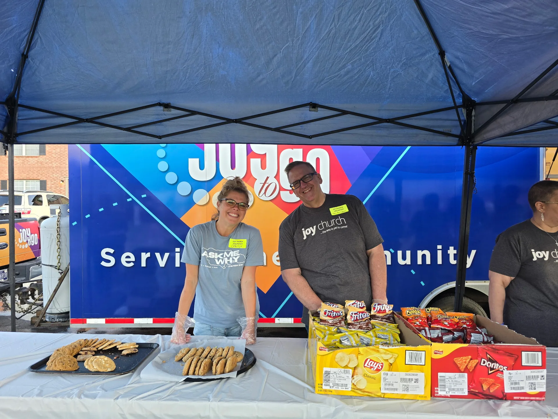 Joy To Go snack table at a community event
