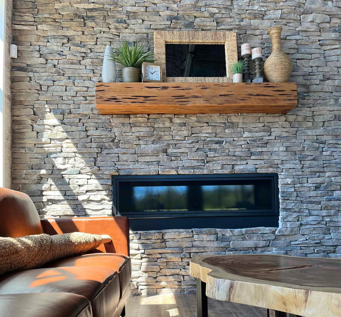Lounge seating beside the fireplace at Kairos Coffeehouse