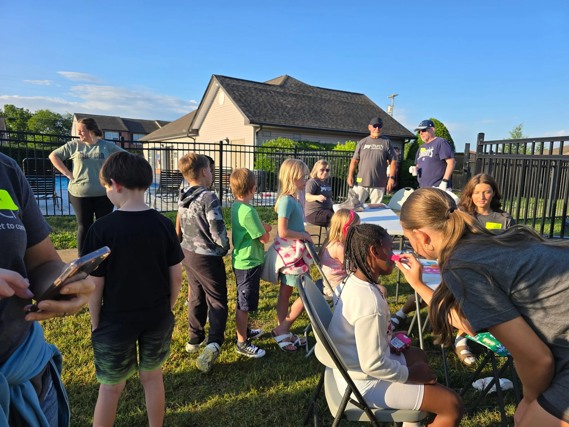 Face painting at a neighborhood outreach