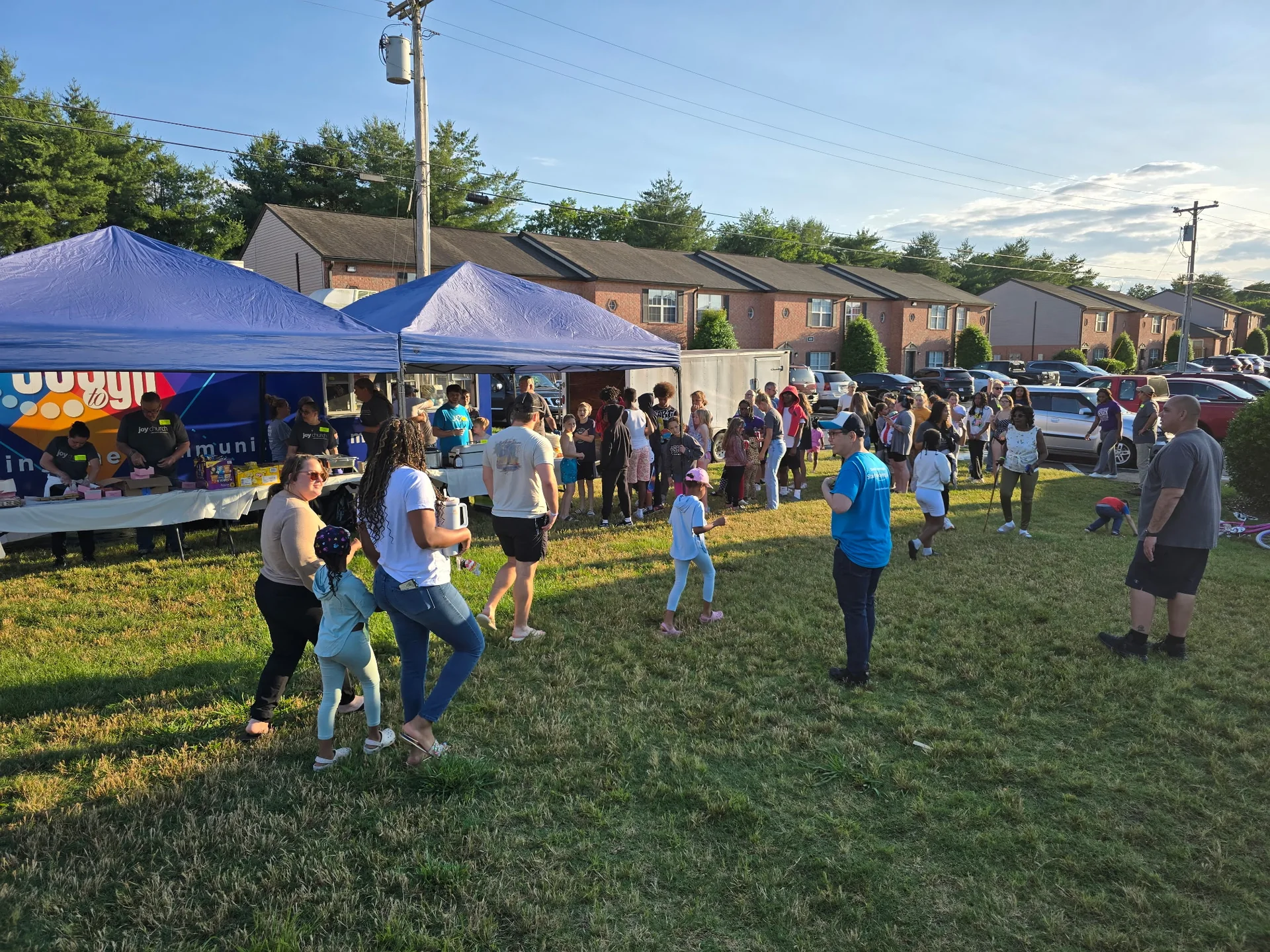 Neighbors gathered at a Joy Church community outreach
