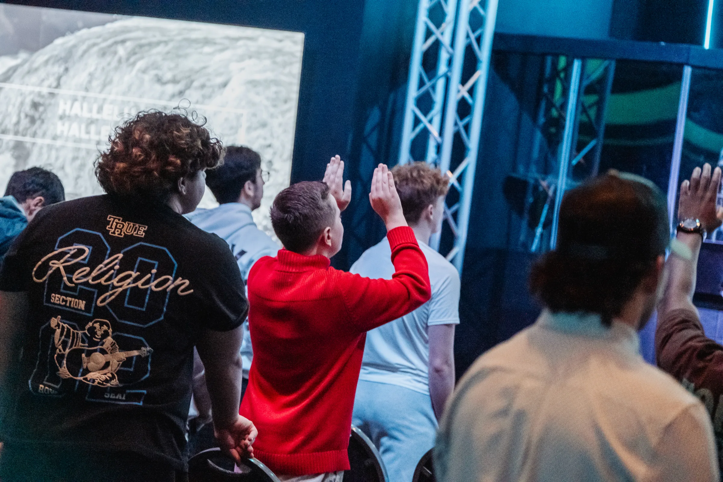 Students worshipping near the stage