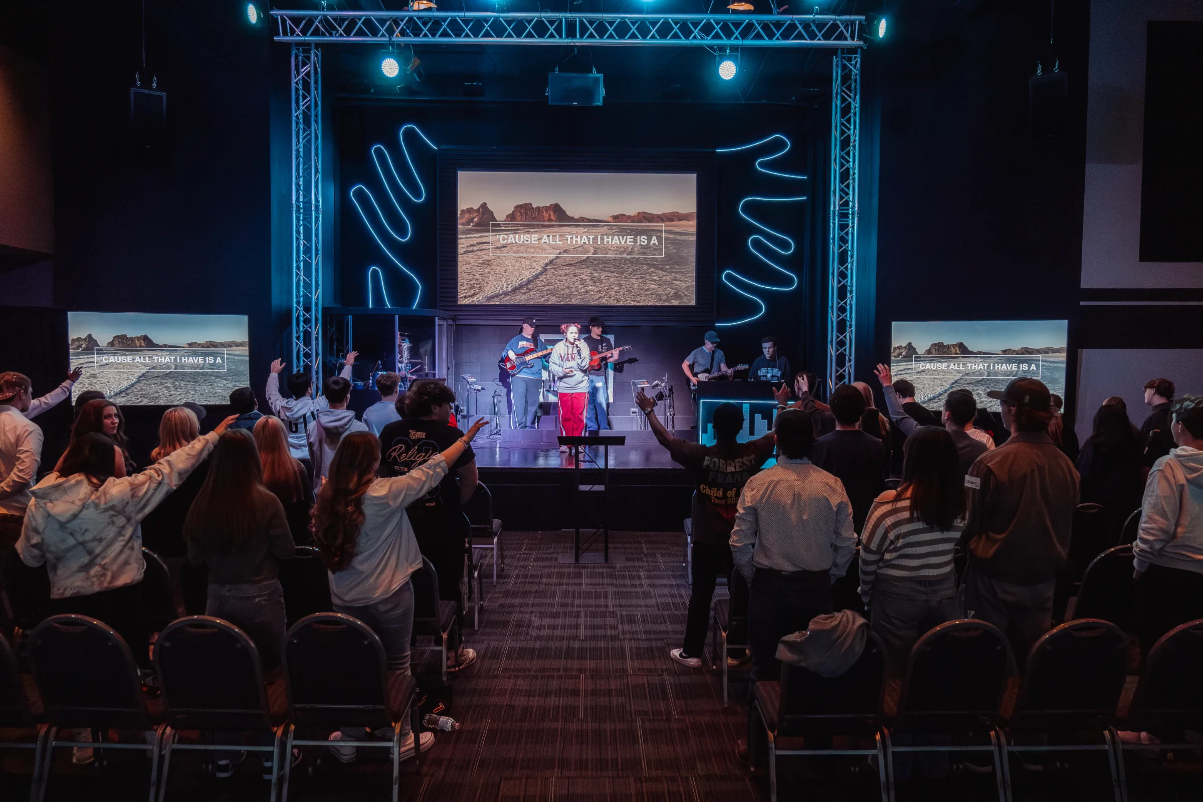 Wide view of the stage during worship