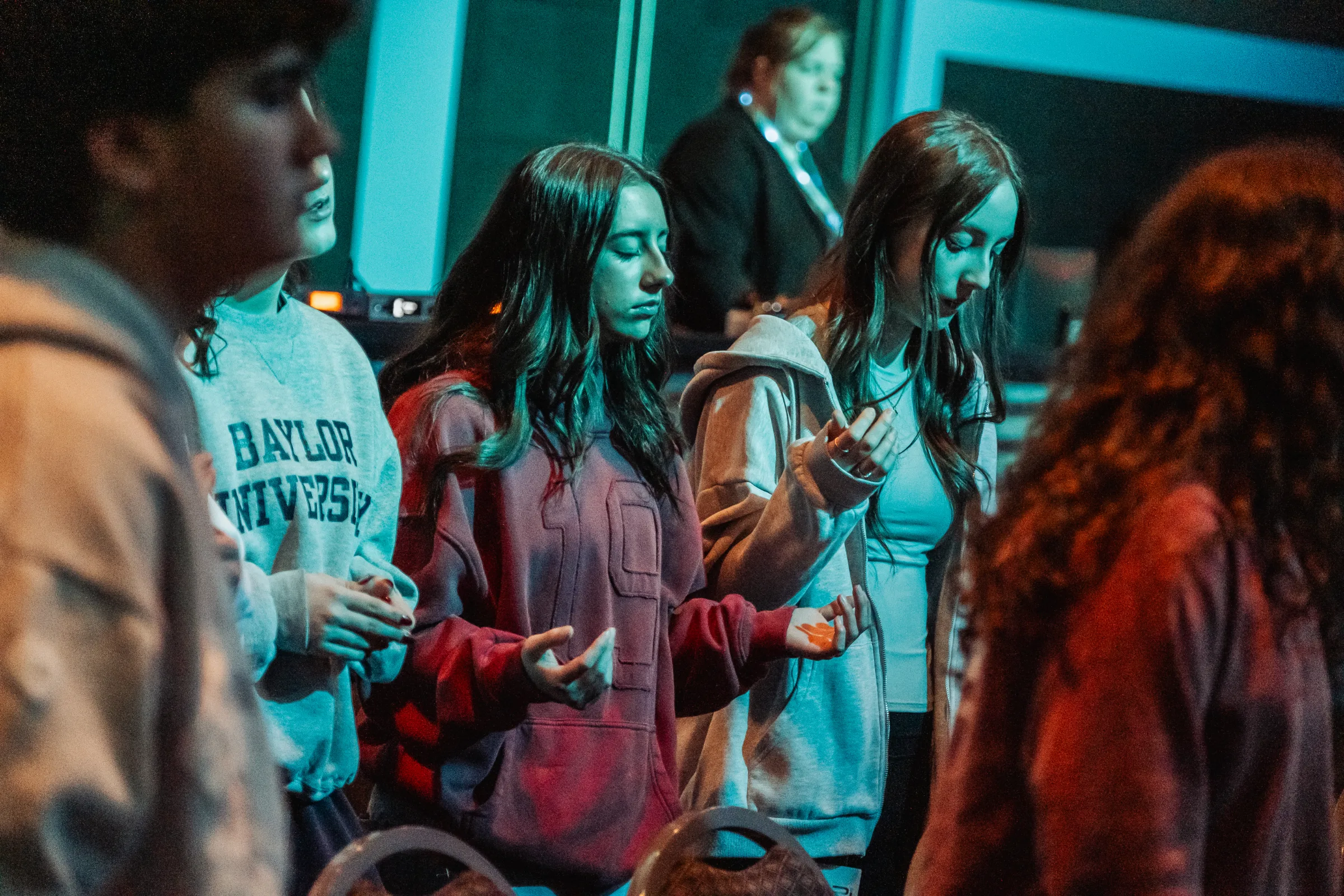 Students worshipping together