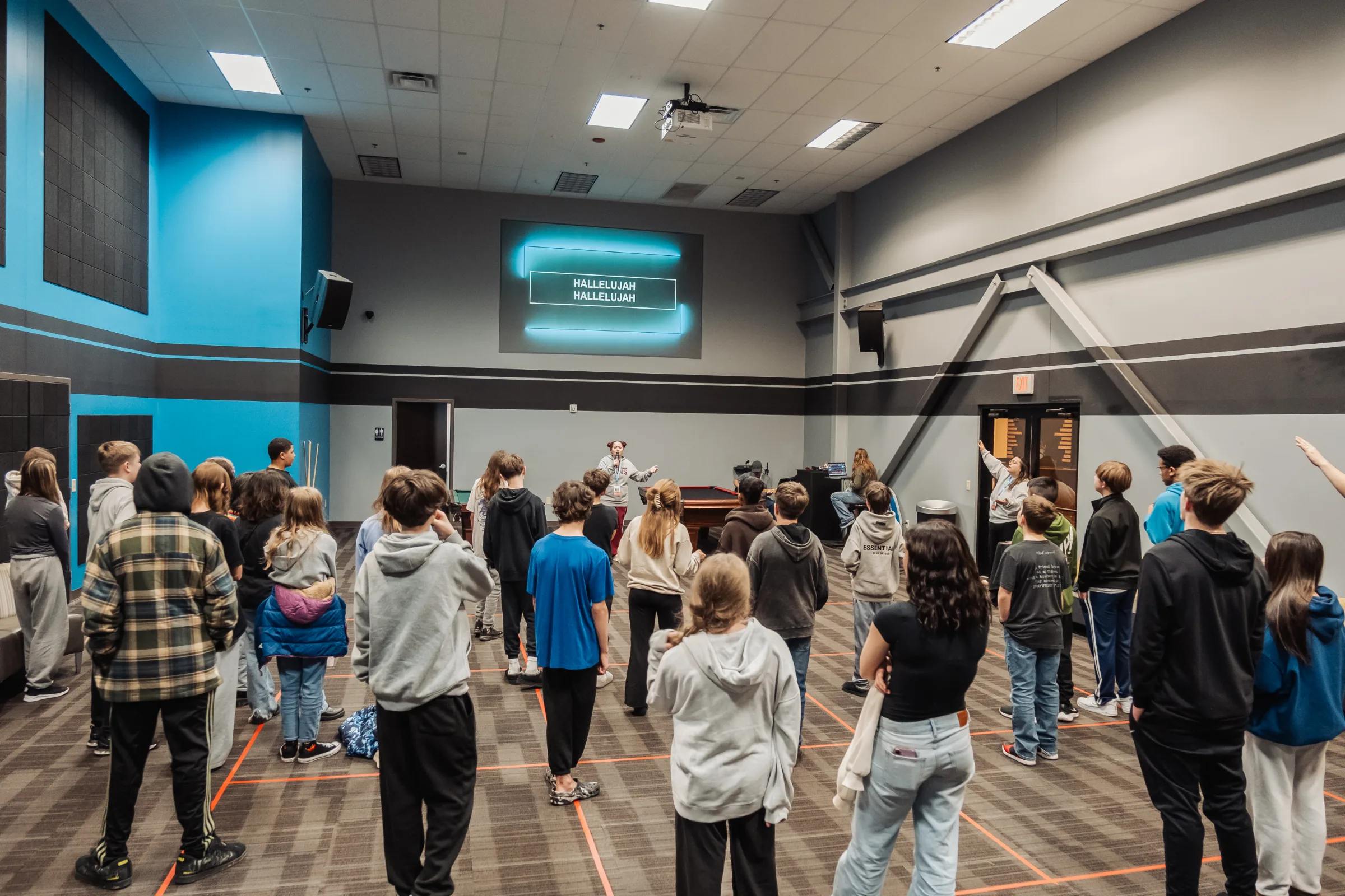 Students gathered in the game room
